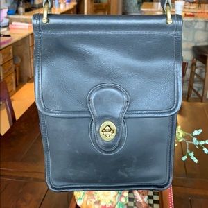 Coach purse with adj strap. Well loved. Black.